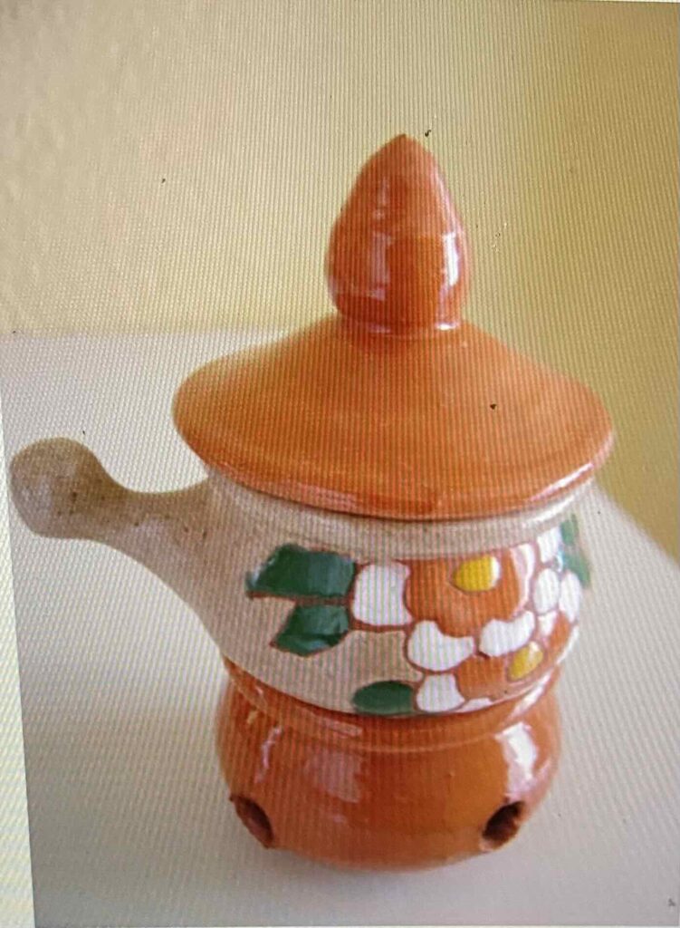 Ceramic jars with lids that looked like tits