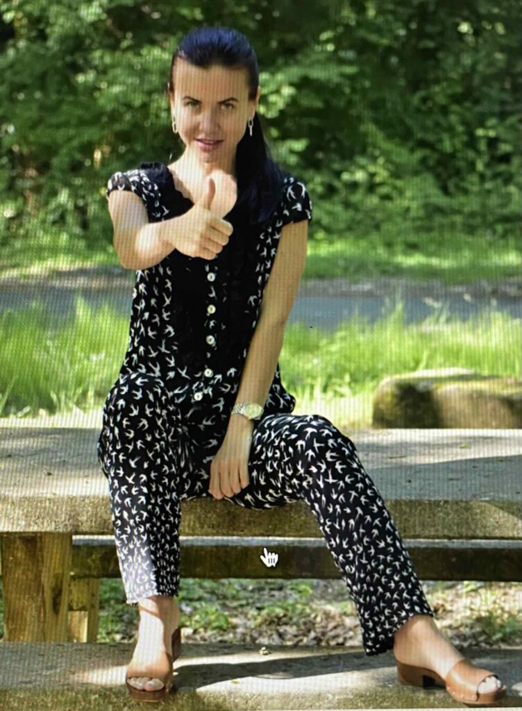 This is a random lady who posed for her pic - Thumbs Up.